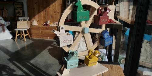 Decorative wooden engraved ferris wheel with names