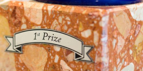 Trophy with a marbled base and engraved on Flexilase™ engraving material label displaying 1st Prize