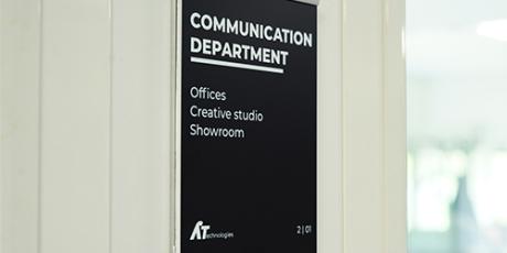 Wall indoor signage for communication department with office and showroom directions