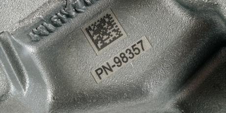 Laser marking of a part number and datamatrix code on a rough cast surface
